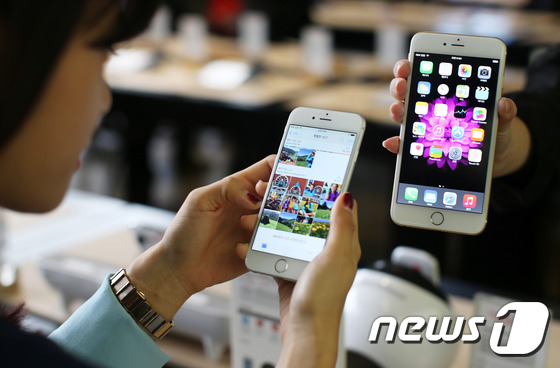 iPhone6“襲”韓 運(yùn)營商攜手“果粉”熱情迎接（組圖）