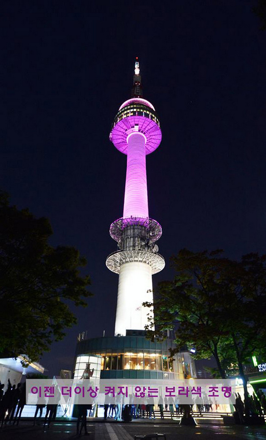 首爾塔夜晚變顏色提示空氣質(zhì)量 紅色為嚴重污染