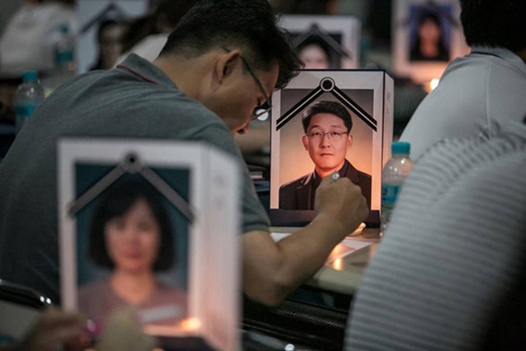 自殺率居高不下 韓國政府出奇招辦“假死體驗”【組圖】