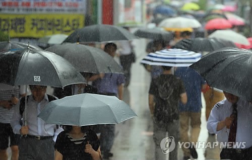 暴雨席卷韓國(guó)  酷暑中旬來(lái)臨圖片來(lái)源：韓聯(lián)社